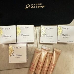 Clarins precious face+ eye cream/ face lift serum